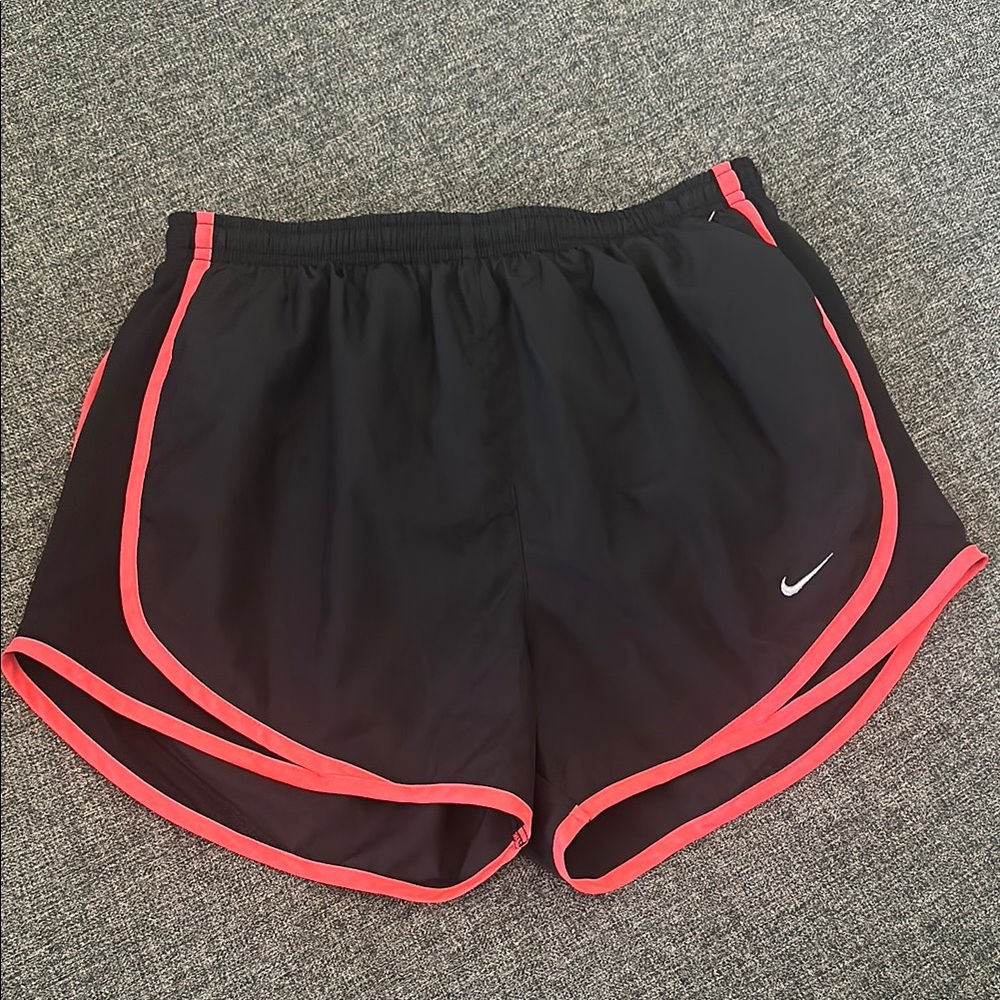 Nike Black and Pink Athletic Shorts with Curved Hem
